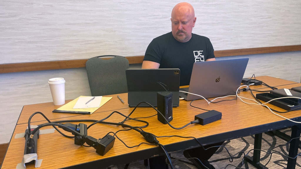 Big Brothers Big Sisters of America Conference 2022 Chris Rogers at desk